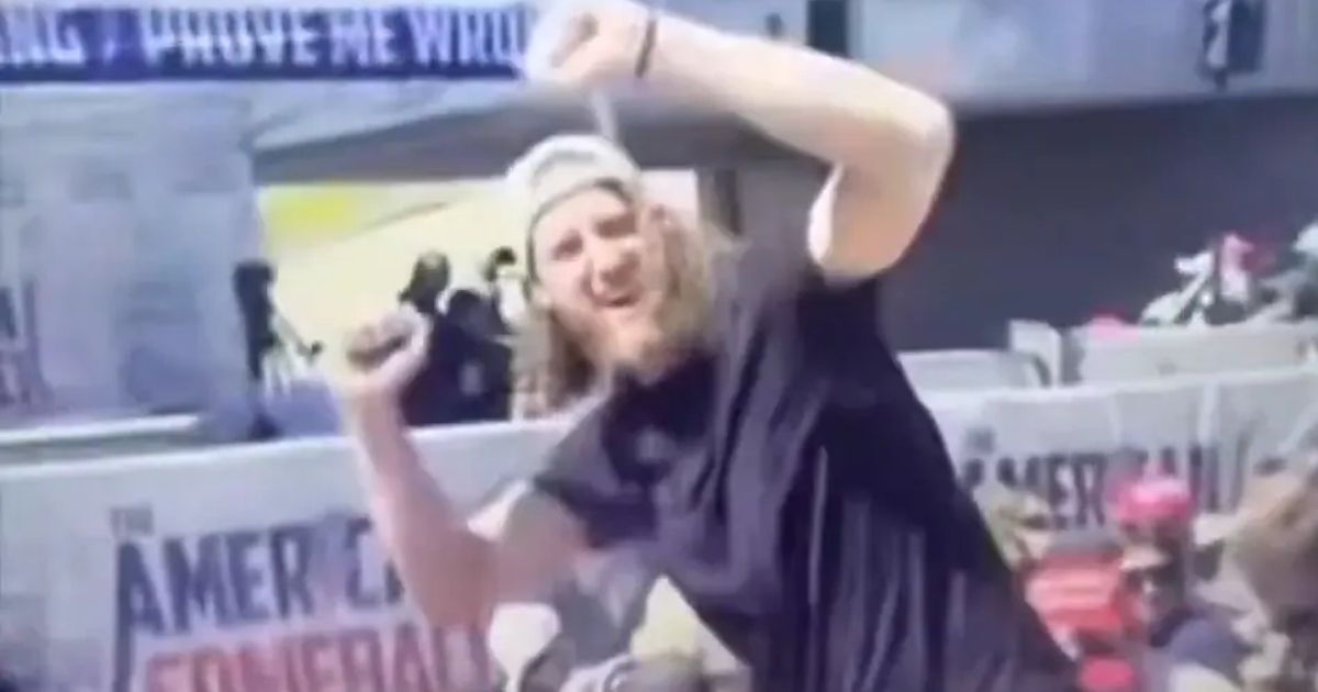 copy of articles thumbnail 1200 x 630 2025 09 12t143134 307.jpg - 'Who Celebrates Death?'- Mystery bearded man in crowd at Charlie Kirk shooting seen cheering and looking back after gunshot