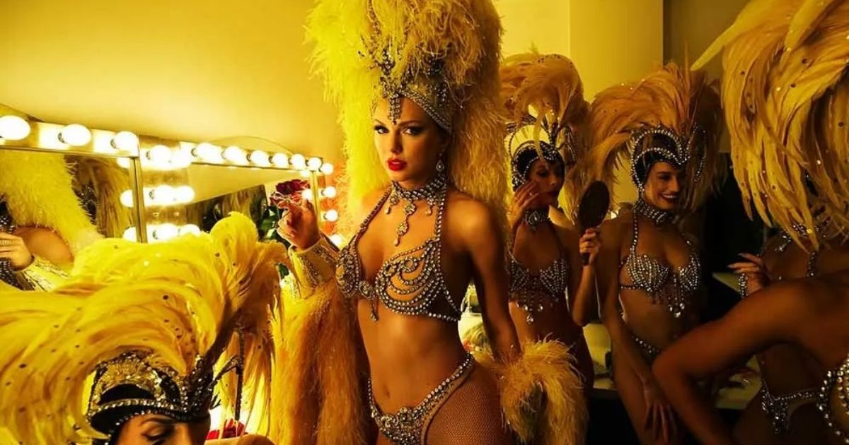 copy of articles thumbnail 1200 x 630 100 4.jpg - Taylor Swift Shares Sexy New Photos from The Life of a Showgirl as She Celebrates Record-Breaking 'Wild' New Album