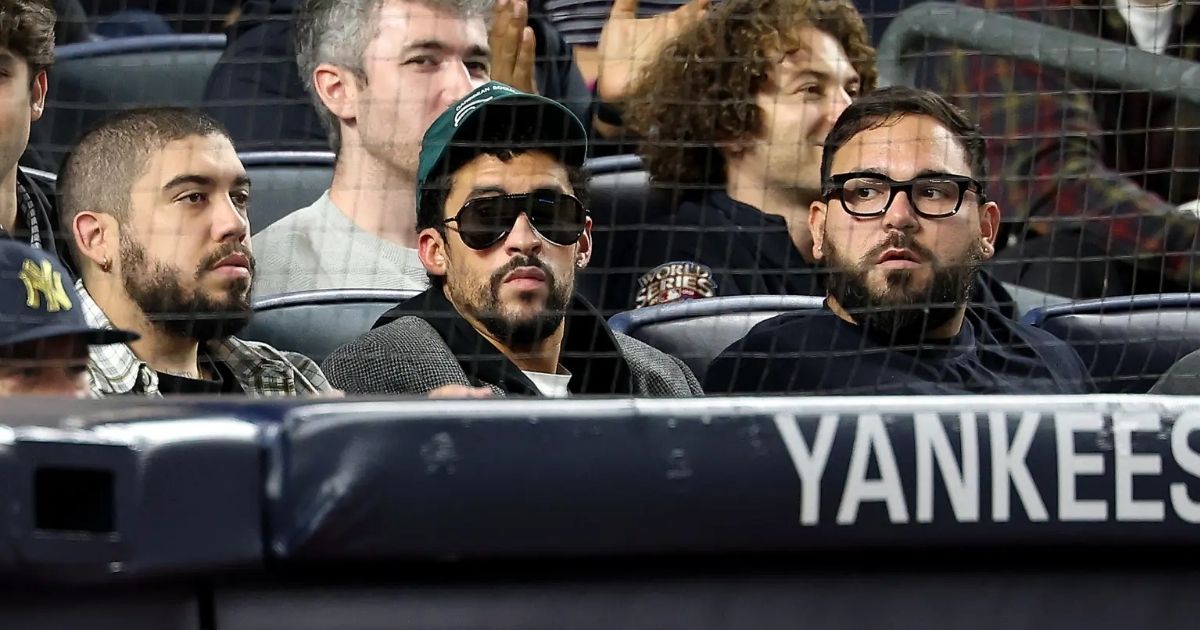 copy of articles thumbnail 1200 x 630 2025 10 10t234553 932.jpg - 'This Man Doesn't Represent the USA'- Bad Bunny Slammed For 'Sitting' During 'God Bless America' At Yankee Stadium as Super Bowl Controversy Grows